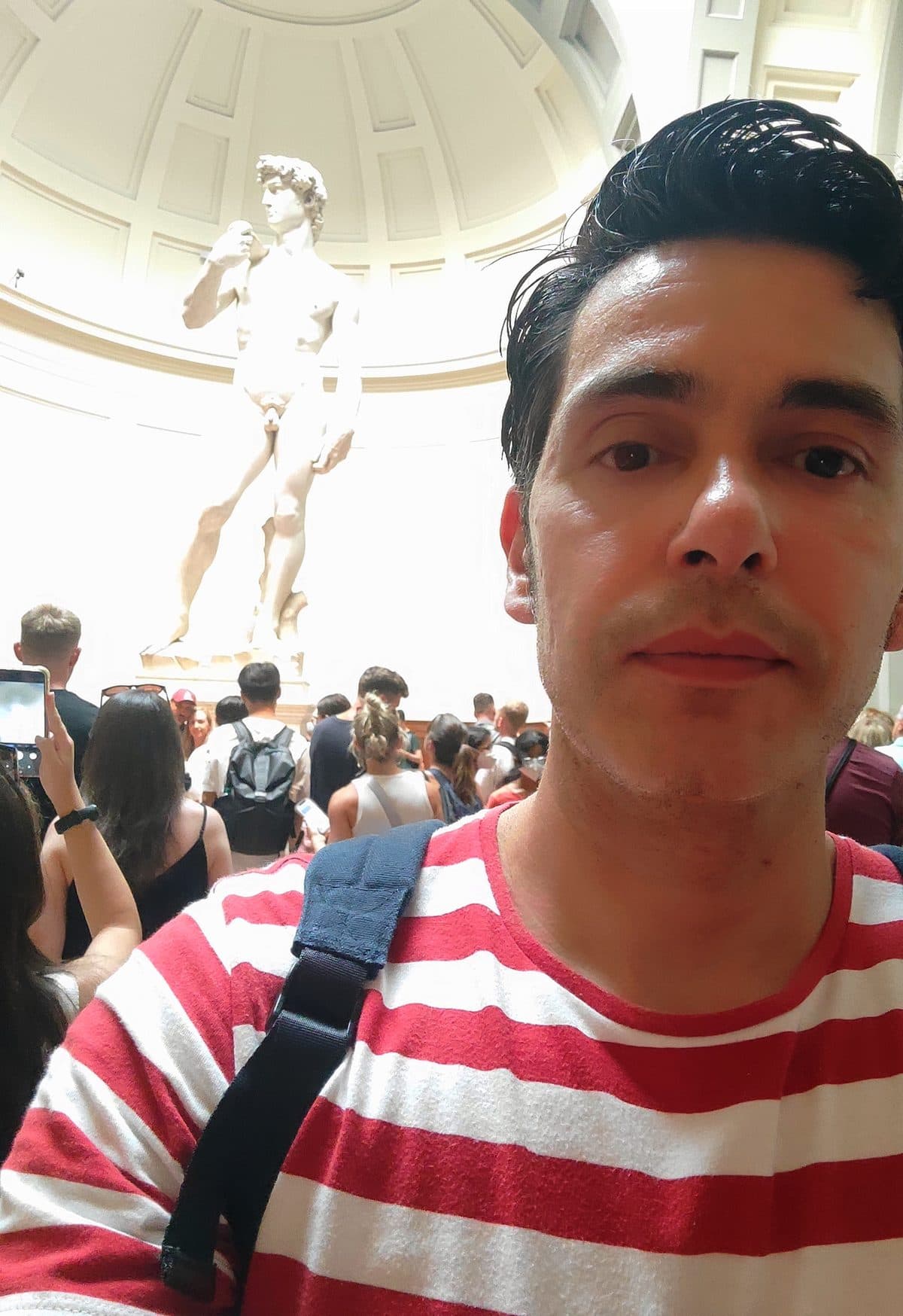 Diego Fresno in front of Michelangelo's David at the Galleria dell'Accademia in Florence, July 2022