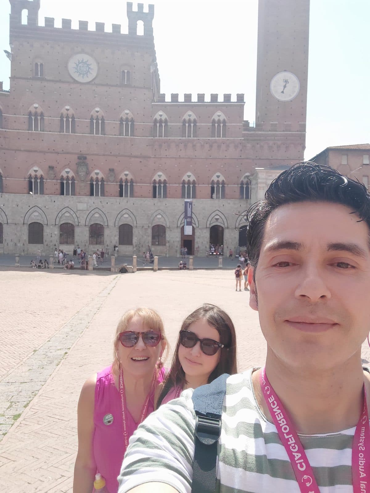 Piazza del Campo in Siena, the sloping shell-shaped square, seen on a summer afternoon